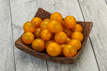 Fresh yellow cherry tomato heap