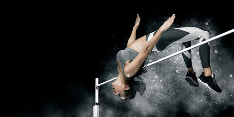 Woman in action of high jump. Sports banner - obrazy, fototapety, plakaty
