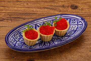 Apetizer - tartlet with red caviar