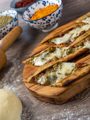 Traditional turkish baked dish pide. Turkish pizza pide, Middle eastern appetizers. Turkish cuisine. Top view. Pide with meat filling