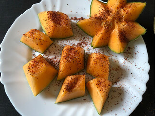 Beautiful melon with chili cut into pieces