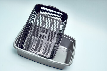 New gray, empty cat tray. Toilet for the cat.