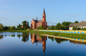 Neo-Gothic church of St. Anthony of Padua in the city of Pastavy. Vitebsk region. Belarus - obrazy, fototapety, plakaty