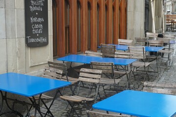 Empty streets of city of Zurich during coronavirus pandemic Covid-19. Tables in pedestrian zone...