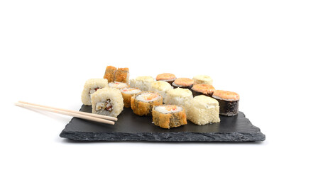 baked rolls in assortment on a stone for serving dishes, white isolated background, horizontal view