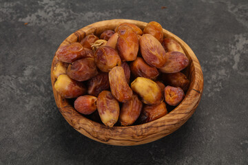 Sweet tasty dry dates in the basket