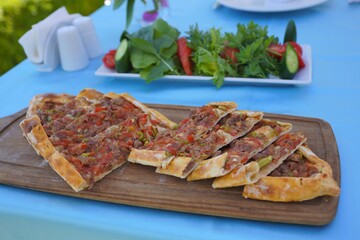 the pocket of pide filled with seasoned minced meat