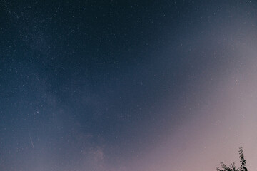 Fototapeta premium Night starry sky in the village in spring