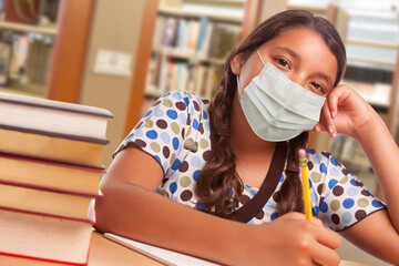 Hispanic Girl Student Wearing Face Mask Studying in Library