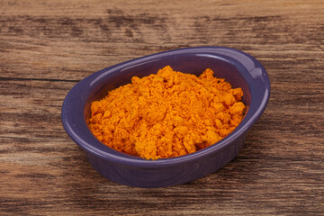 Tumeric powder in the bowl