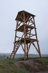 Fototapeta na wymiar Wooden watchtower in the tract Kholodny Yar in Cherkasy region, Ukraine