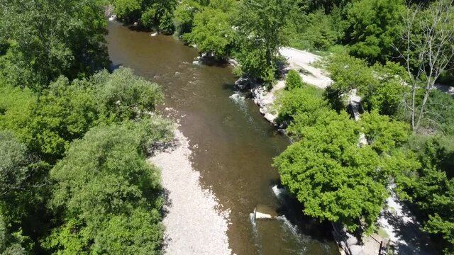 people fishing on river top view