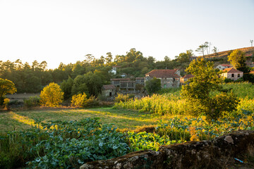 Sun setting on a old European countryside farm