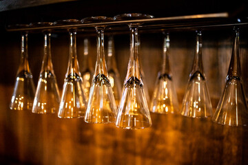 Close up of row of small empty glasses in the night club