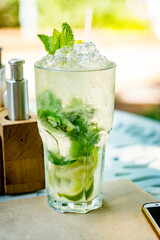 mojito cocktail on wooden table