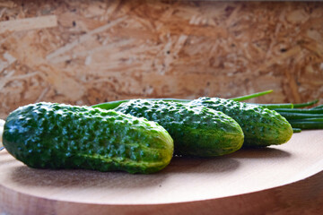 Photo of cucumbers on a cutting Board plucked for lunch