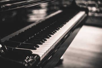 Professional black piano on a stage - Photo of classic musical instrument in black and white
