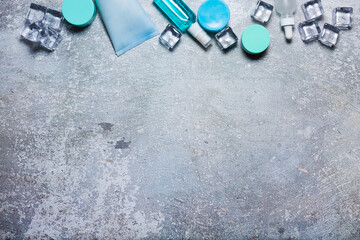 Fototapeta premium Cosmetics on a concrete background