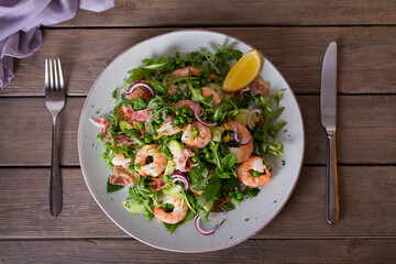 Shrimp bacon and green peas salad. Healthy food. View from above, top studio shot
