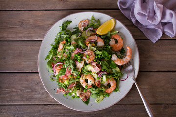 Shrimp bacon and green peas salad. Healthy food. View from above, top studio shot