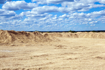The hill-like stone ridge of the Bornitsky quarry. The village of New Khinkolovo, Gatchinsky district, Leningrad region. Russia