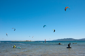 Athens, Greece, July 2020: Windsurfing and Kite Surfing on a very sunny day 