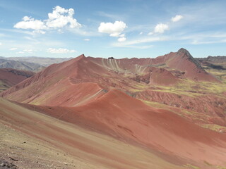 Fototapeta na wymiar Rainbow Mountain Peru and surrounding landscape 2019