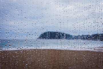 Cloudy day on the coast with drops in the foreground