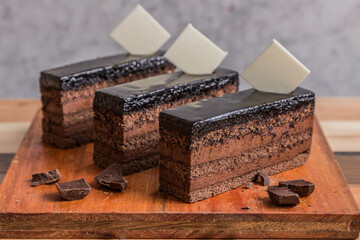 chocolate layer cake on wooden table