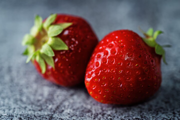 Raw fresh strawberries on a light background