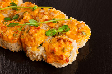 Japanese food: Set of salmon sushi and rolls with salmon and eel