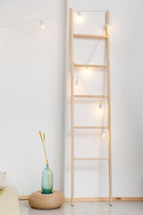 living room with hammock and white walls