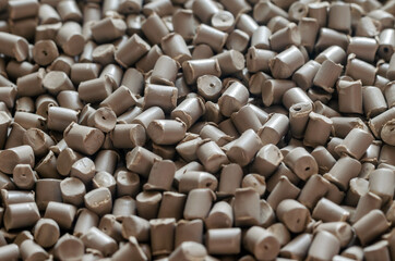 Fototapeta premium Gray polymer dye in granules, background texture