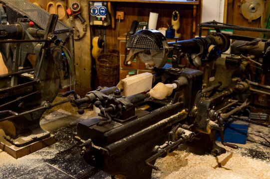 ZAANSE SCHANS, NETHERLANDS - DECEMBER 31, 2017: Machine for clogs manufacturing in the Wooden Shoe Workshop of klompen, traditional shoes of Holland