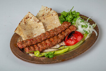 Turkish Adana Kebab Dinner on wooden background.