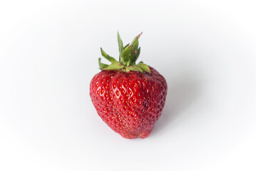 Eco or Bio Strawberry Isolated on White Background - Single Berry Close up View Shot with Natural Light