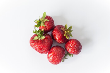 Eco or Bio Strawberry on White Background - Five Berries Composition Isolated Top View Shot with Natural Light