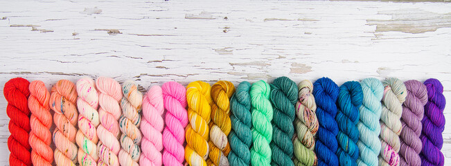 Rainbow border of colorful yarn