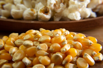 popcorn and corn in the wooden spoon