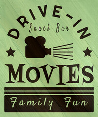 Drive-in movie sign on wood grain texture
