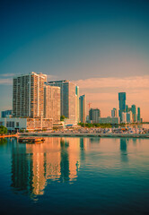 Obraz premium reflection miami city skyline at sunrise night buildings Downtown 