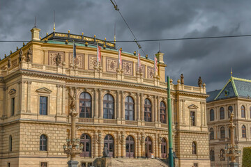 Fototapeta na wymiar Rudolfium Concert Hall on Prague morning under dark clouds and sky nobody