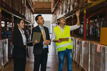 business people have business discussion in factory warehouse