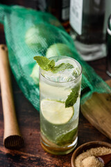 ice cold mojito on wooden background