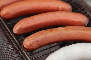 Sausages on the grill