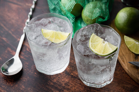 ice cold gin tonic image on wooden background