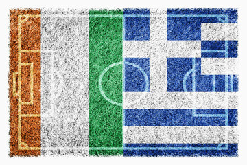 Fototapeta na wymiar Flags of Ivory Coast and Greece on soccer field