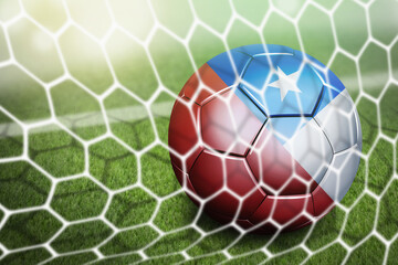 Chile soccer ball in goal net