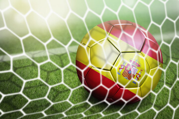 Naklejka premium Spain soccer ball in goal net