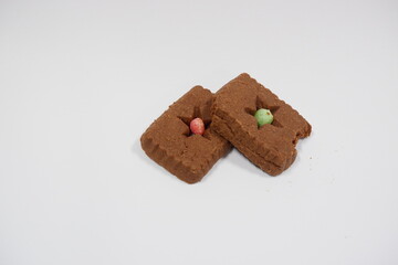 Two chocolate cookies on a white background (Top View)